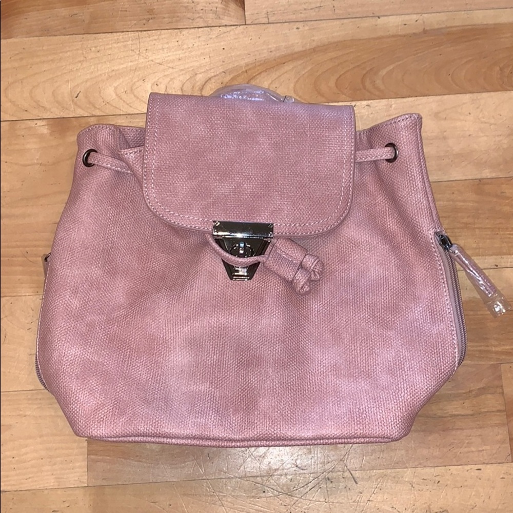 Never used blush pink backpack/purse